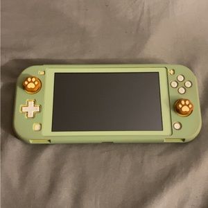 YELLOW Nintendo Switch Lite with green case